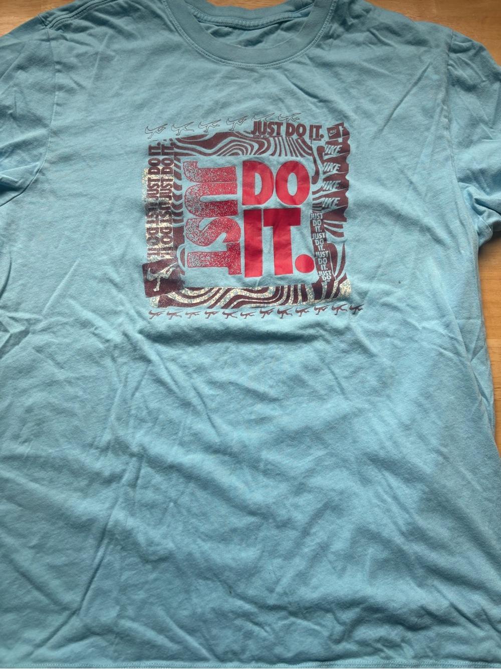 Nike Light Blue Tee with Red and Brown Graphic